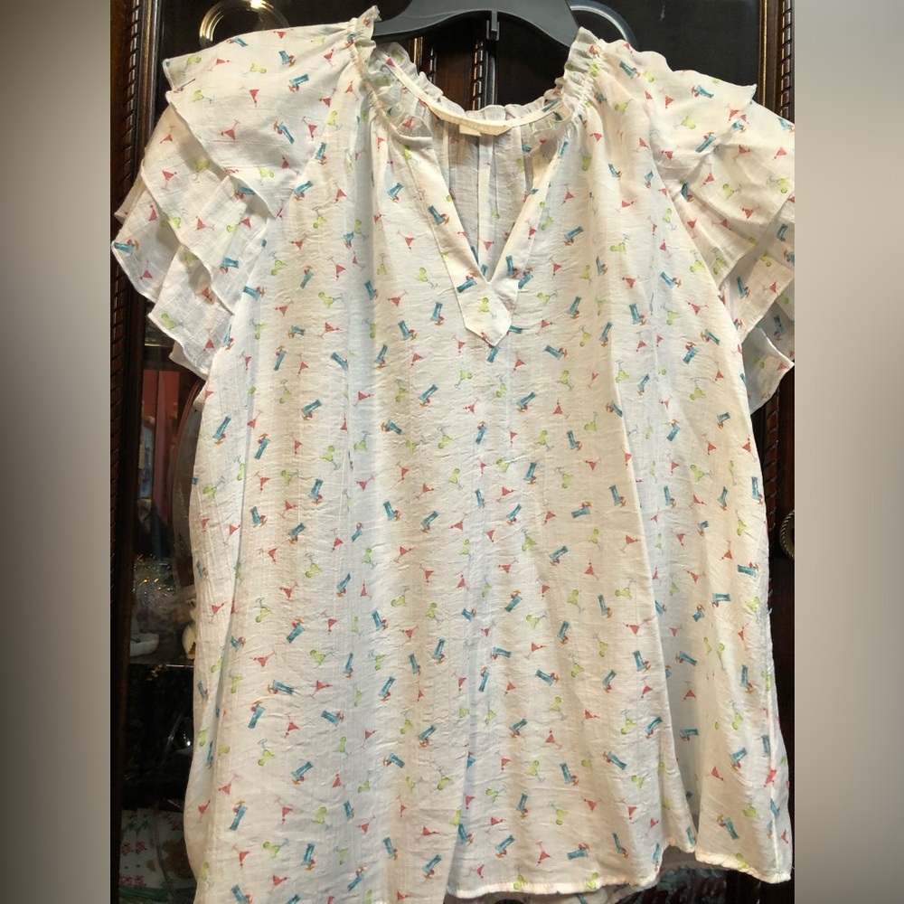 Women’s Flutter layered Sleeves on a White blouse Printed with cocktails.